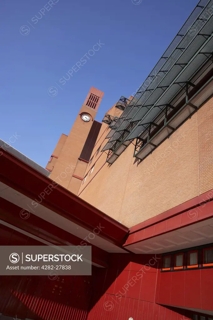 England, London, The British Library. An exterior view of The British Library. The Library holds over 13 million books, 920,000 journal and newspaper titles, 57 million patents and 3 million sound recordings.