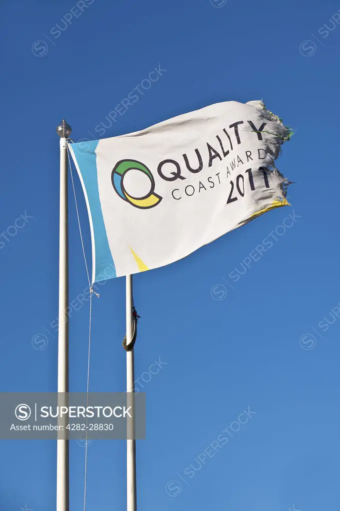 England, Essex, Southend on Sea. A Quality Coast Award flag in Southend on Sea symbolising that the beach is one of the best in Britain.