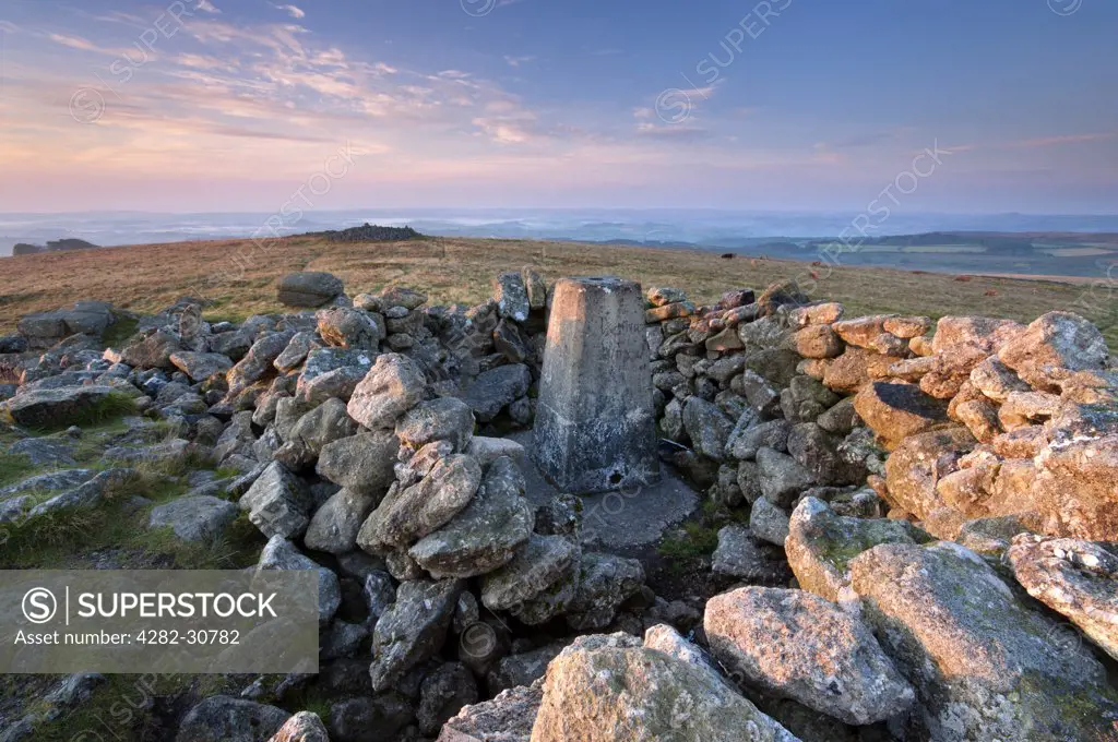 England, Devon, Rippon Tor. Dawn light at Rippon Tor Triangulation point in Dartmoor National Park.