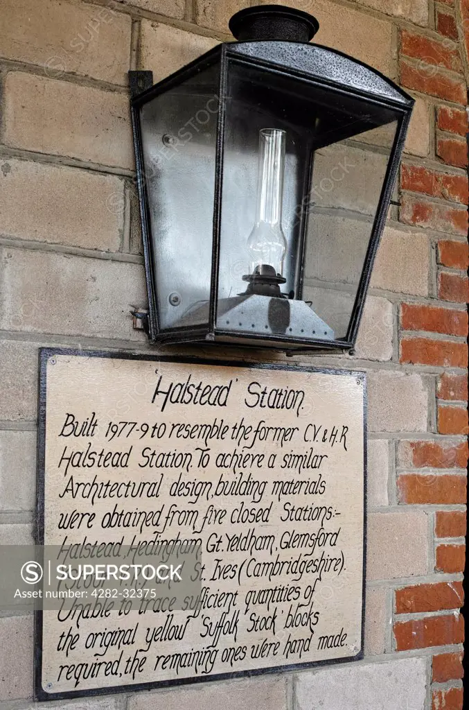 England, Essex, Castle Hedingham. A lamp and sign on the Colne Valley and Halstead railway.