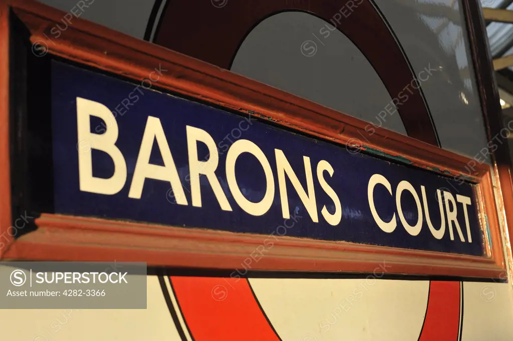 England, London, Barons Court. Barons Court underground station sign.