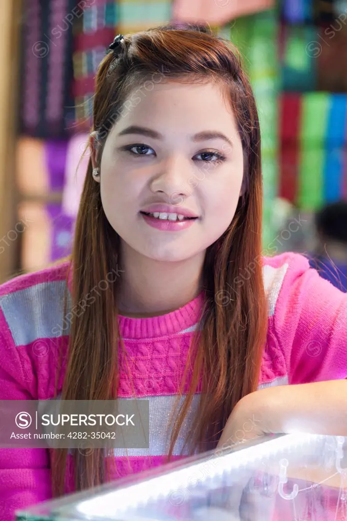 Myanmar, Yangon, Yangon. A beautiful Burmese girl in Bogyoke (formerly Scott) Market in Yangon in Myanmar.