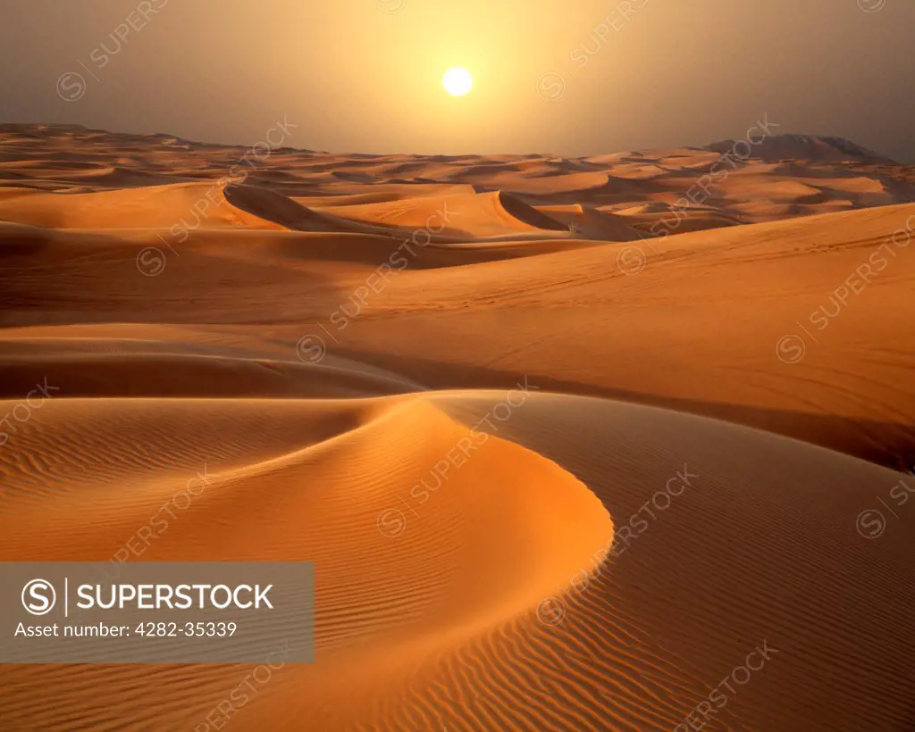 United Arab Emirates, Dubai, Dubai Desert. A view towards the sunset across the Dubai desert.