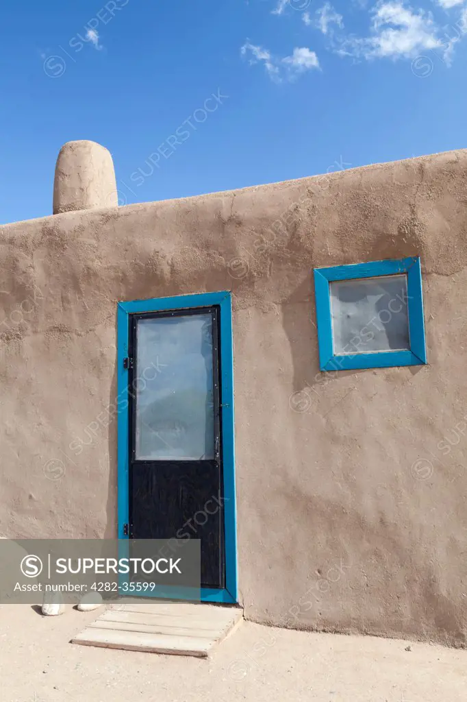 USA, New Mexico, Taos Pueblo. Ancient adobe house in Taos.