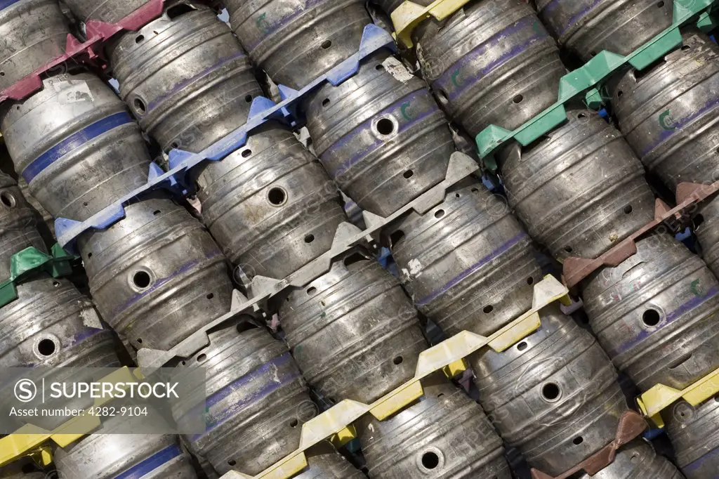 England, West Yorkshire, Leeds. Beer kegs stacked at the Carlsberg Tetley brewery in Leeds.