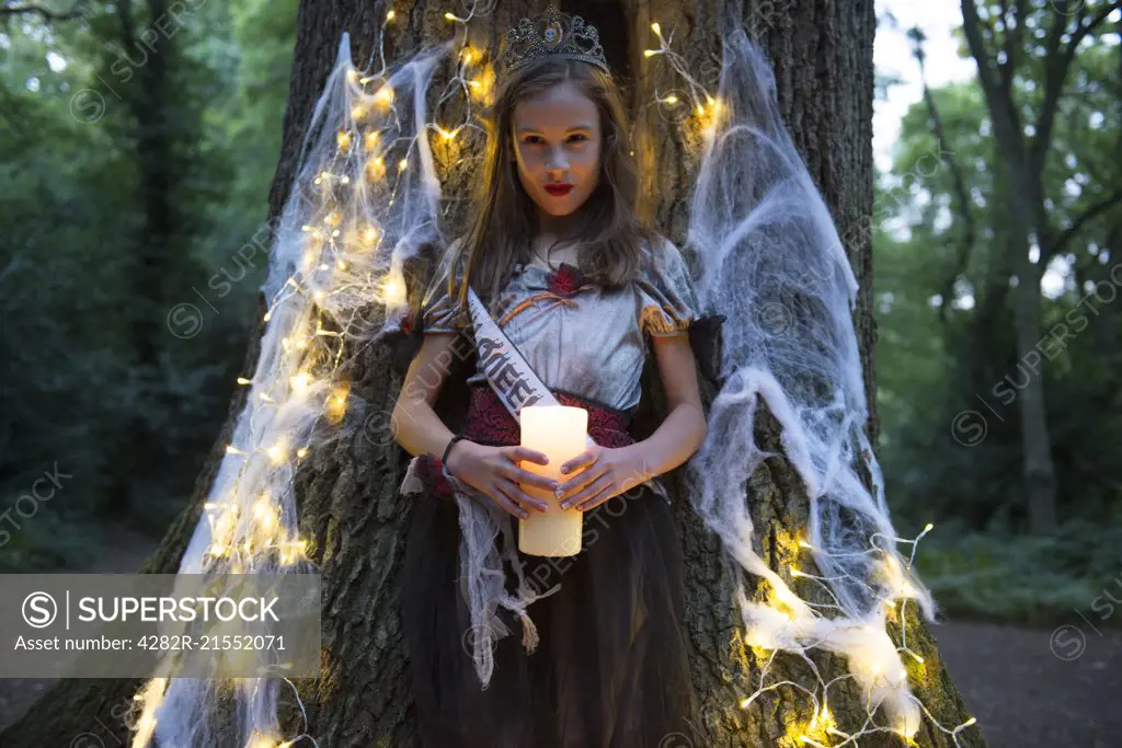 A child dressed in costume for Halloween Night.