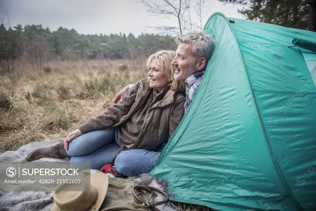 Senior couple enjoying the wilderness from their campsite.