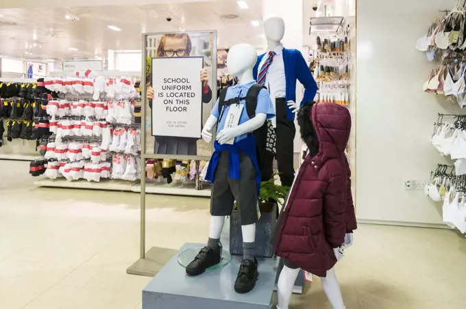 Clothing on display and for sale in a Marks and Spencer store.