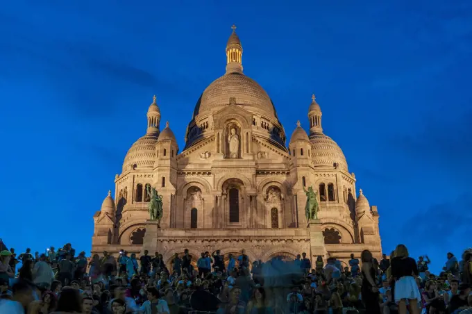 Sacre Coeur Basilica at night at Montmartre in Paris.