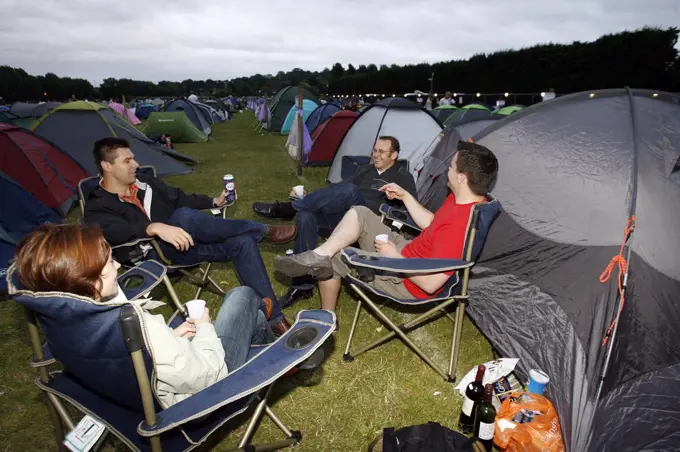 England, London, Wimbledon. Tennis fans queue overnight in their tents for tickets at the Wimbledon Tennis Championships 2008.