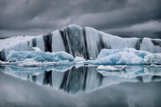 Icebergs in Jokulsarlon Glacial lagoon under a moody sky.