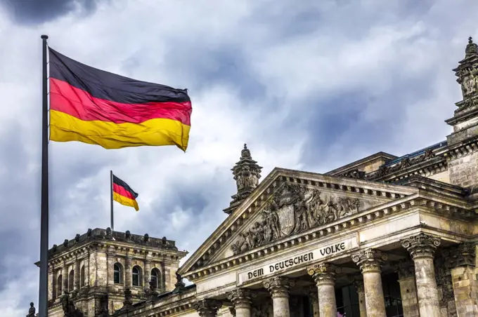 Storm clouds over the Reichstag or German Parliament in Berlin.