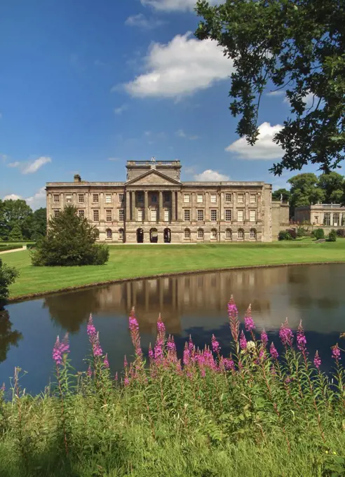 Lyme Hall and Reflection Lake in Lyme Park.