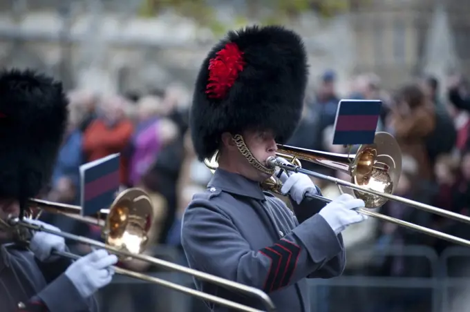 England, London, Whitehall. Military band marches through Whitehall as part of the Remembrance Day Parade.