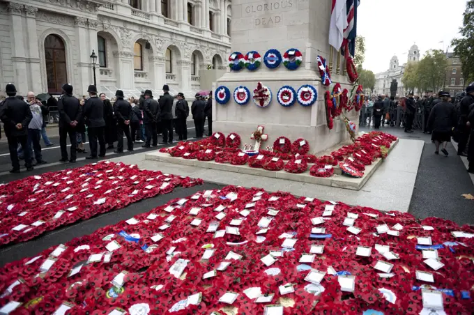 England, London, Whitehall. Metropolitan Police officers form a cordon around the Cenotaph in Whitehall after the Remembrance Day Parade.