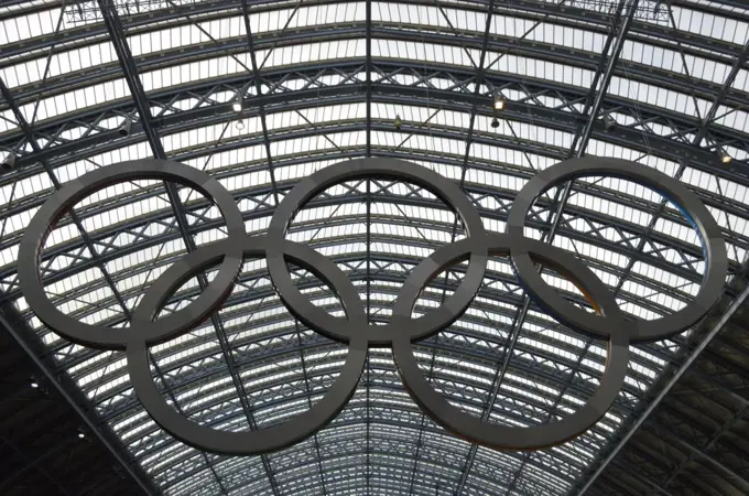 England, London, St Pancras. A giant set of Olympic rings hanging in St Pancras International Station.