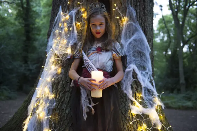 A child dressed in costume for Halloween Night.