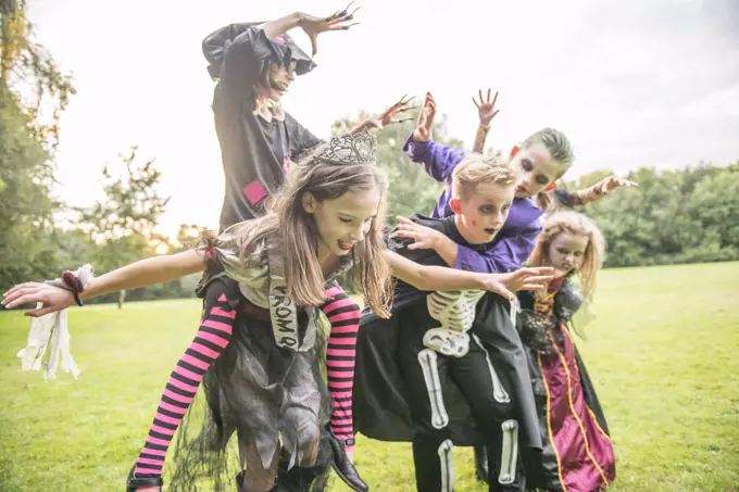 Children dressed as zombies for Halloween Night.