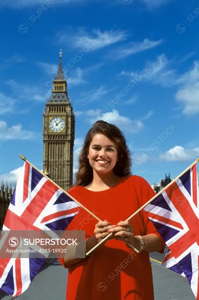 United Kingdom, London, Girl Holding Union Jack Flag