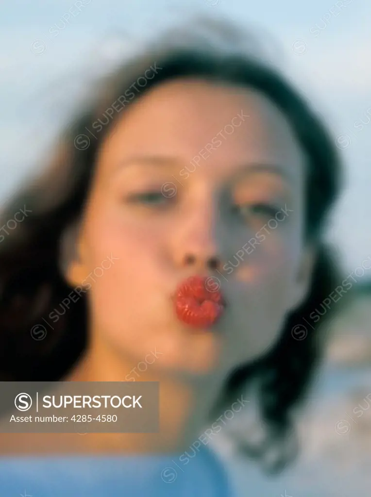 Woman kissing the camera