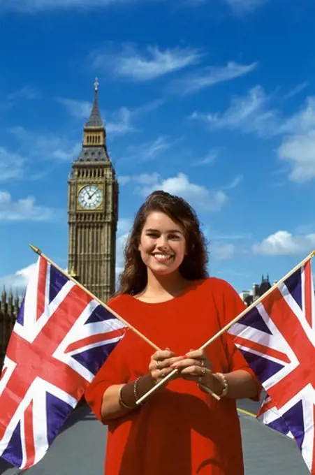 United Kingdom, London, Girl Holding Union Jack Flag