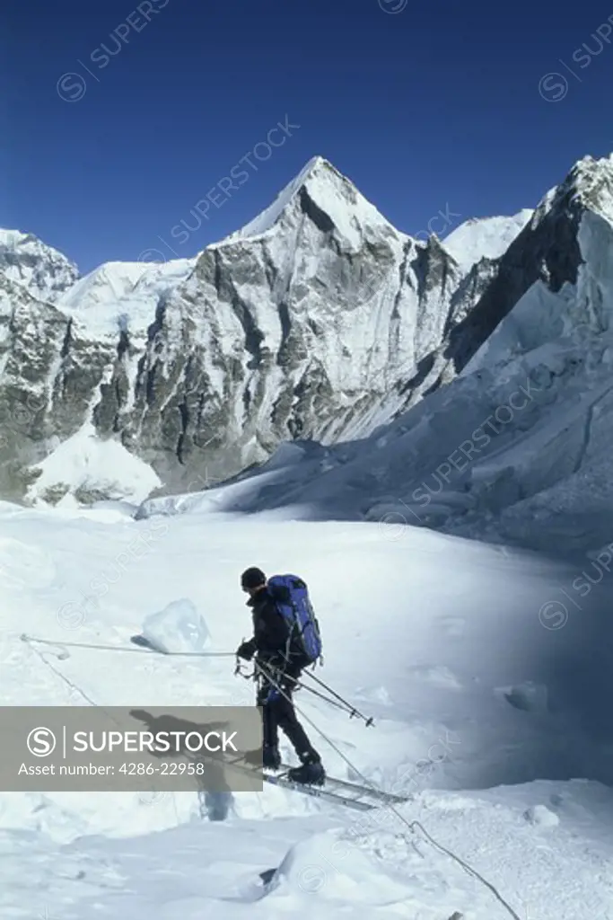 Crossing a crevasse on Mount Everest in the Khumbu Icefall