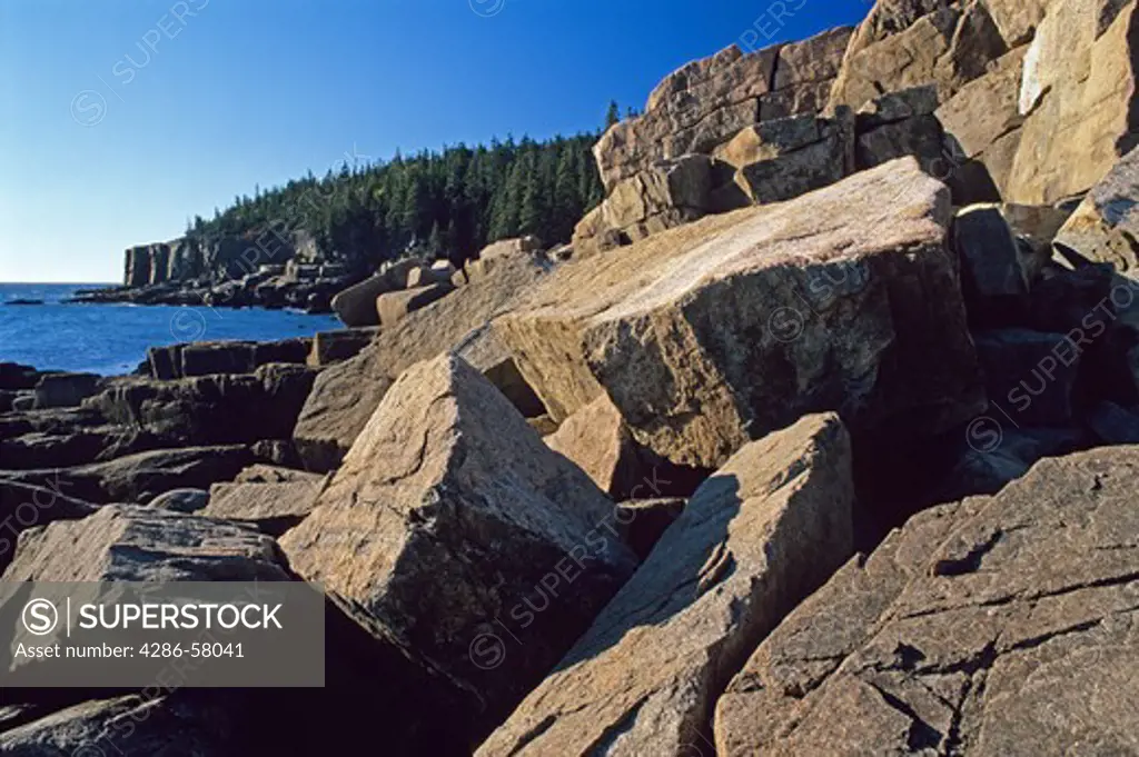 Worn by waves and weather, giant granite boulders tumble near Otter Point, Acadia Nationial Park, Maine