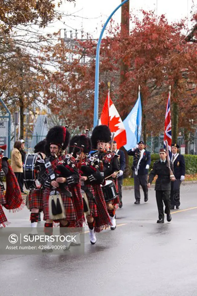 Pipe band in Remembrance Day Parade, Port Coquitlam, BC, Canada