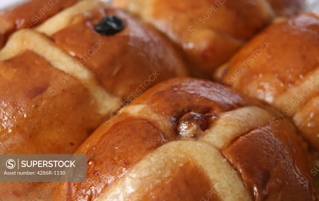 Extreme close-up on hot cross buns