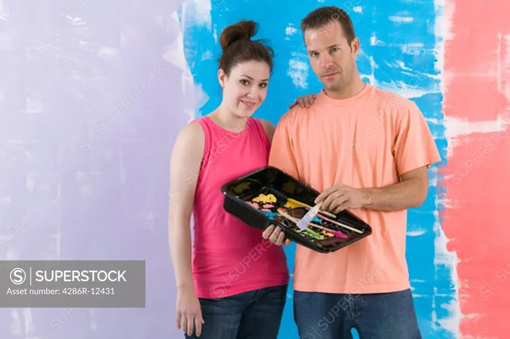 Man and Woman Holding a Paint Tray With Paint Samples, MR-0635 MR-0636