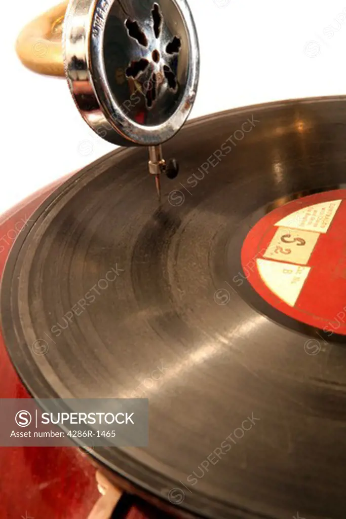 An old 78-rpm record playing on a wind-up gramophone.