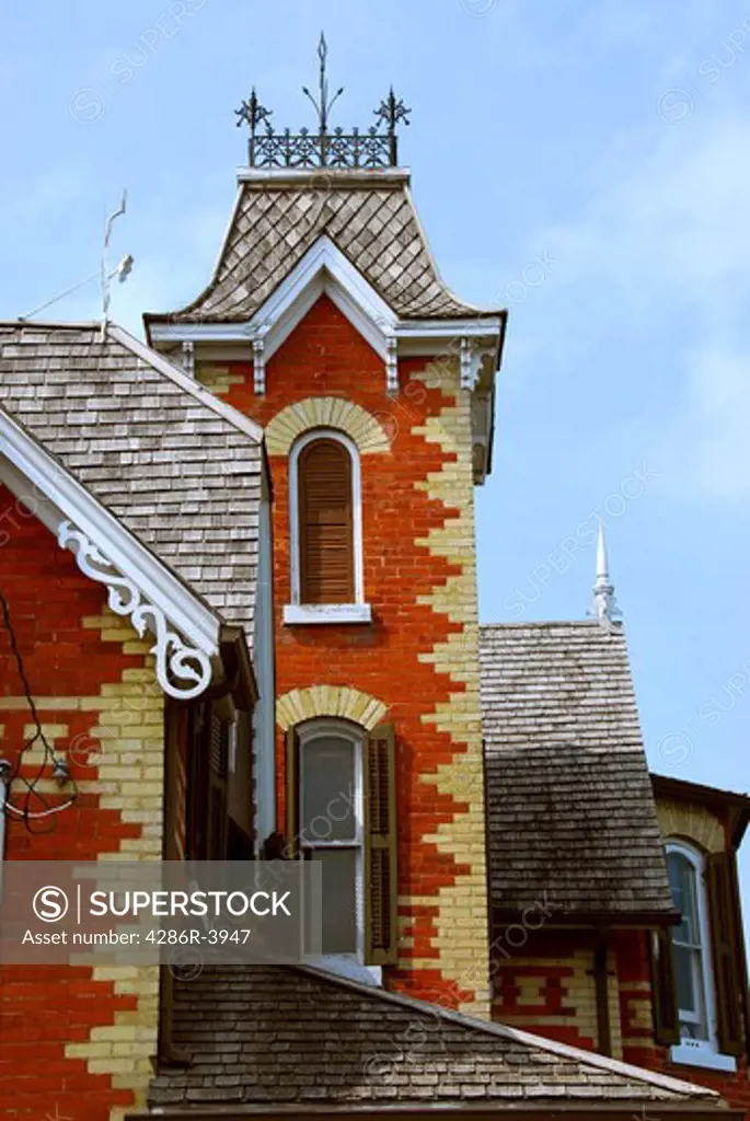 Fragment of a beautiful red brick victorian house