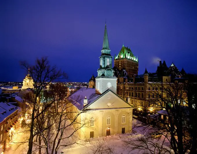 Canada Quebec Quebec City Cathedrale Anglicane and the Chateau Frontenac in winter