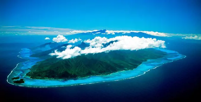 Aerial view of Moorea with Tahiti beyond in French Polynesia