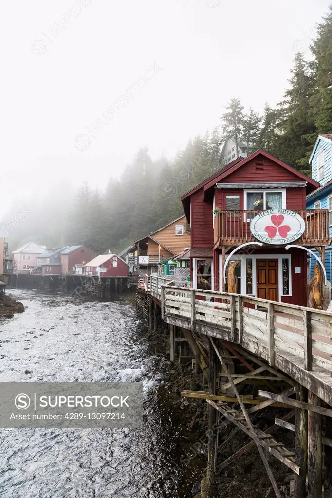 Tourist shops and homes along Creek Street in downtown Ketchikan, Southeast Alaska, USA, Spring