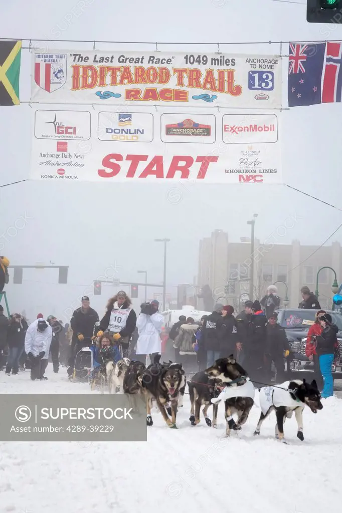 Peter Kaiser and team leave the ceremonial start line at 4th Avenue and D street in downtown Anchorage during the 2013 Iditarod race.