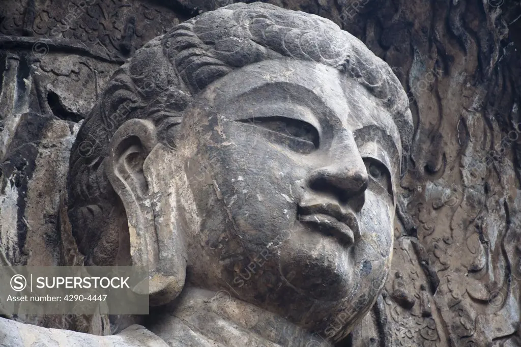 Vairocana Buddha, Fengxian Temple, Longmen Grottoes and Caves, Luoyang, Henan Province, China. Tang Dynasty