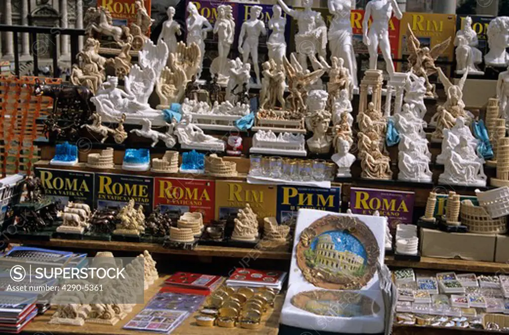 Rome guide books and souvenirs on display on a stall, Rome, Italy