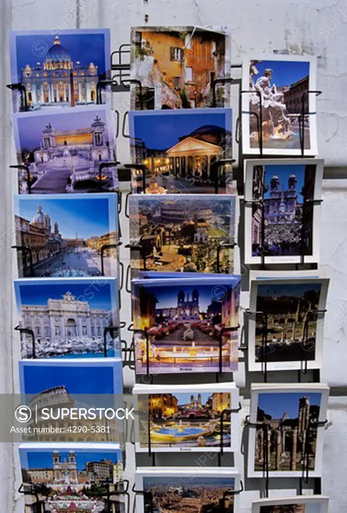 Rome postcards on display outside a shop, Rome, Italy