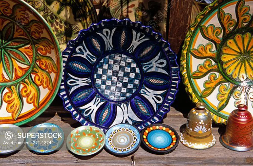 Traditional Bulgarian pottery on display outside gift and craft shop, Veliko Tarnovo, Bulgaria