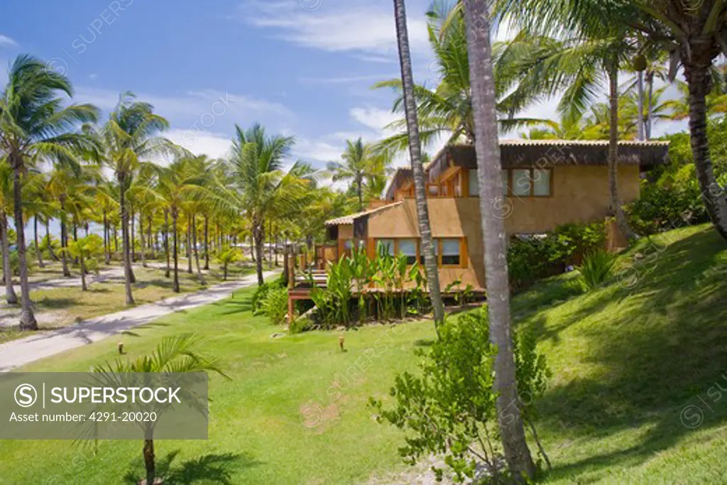 Brazil Beach house in Brazil. Beach house in Brazil overlooking sea and surrounded by palm trees.