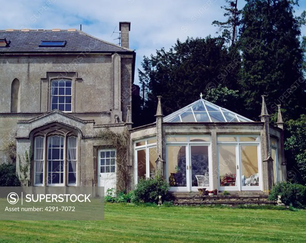 Victorian Gothic house with traditional conservatory