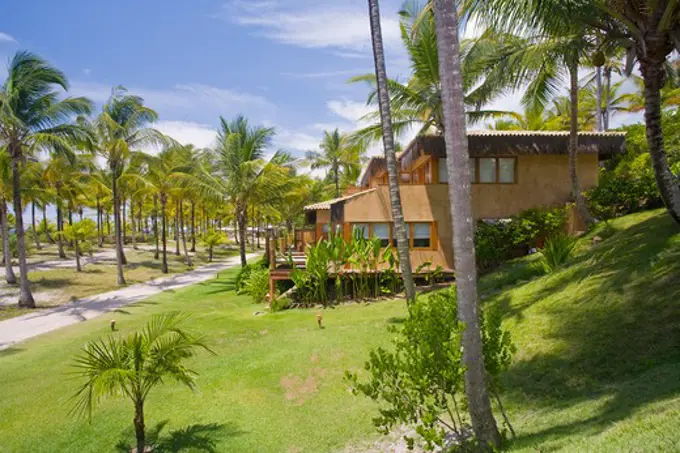 Brazil Beach house in Brazil. Beach house in Brazil overlooking sea and surrounded by palm trees.