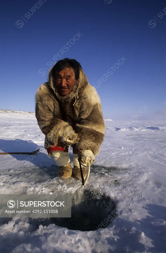 Inuit fishing, Baker Lake Nunavut, Canada