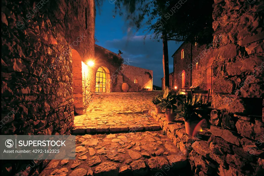 Italy, Tuscany, Cinigiano, Castle of Vicarello, Charming Farm House and resort at dusk