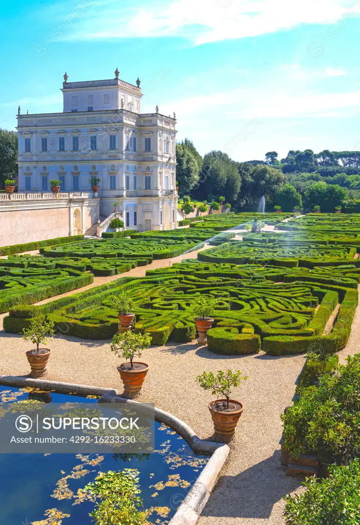 Italy, Rome, Villa Doria Pamphili, the Casino Del Bel Respiro palace with the Secret Garden in the foreground