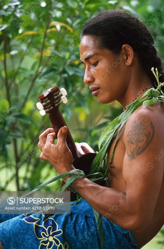 Samoan man playing a guitar, Samoa