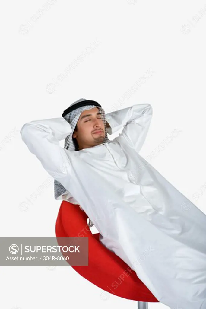 Young man sleeping on chair