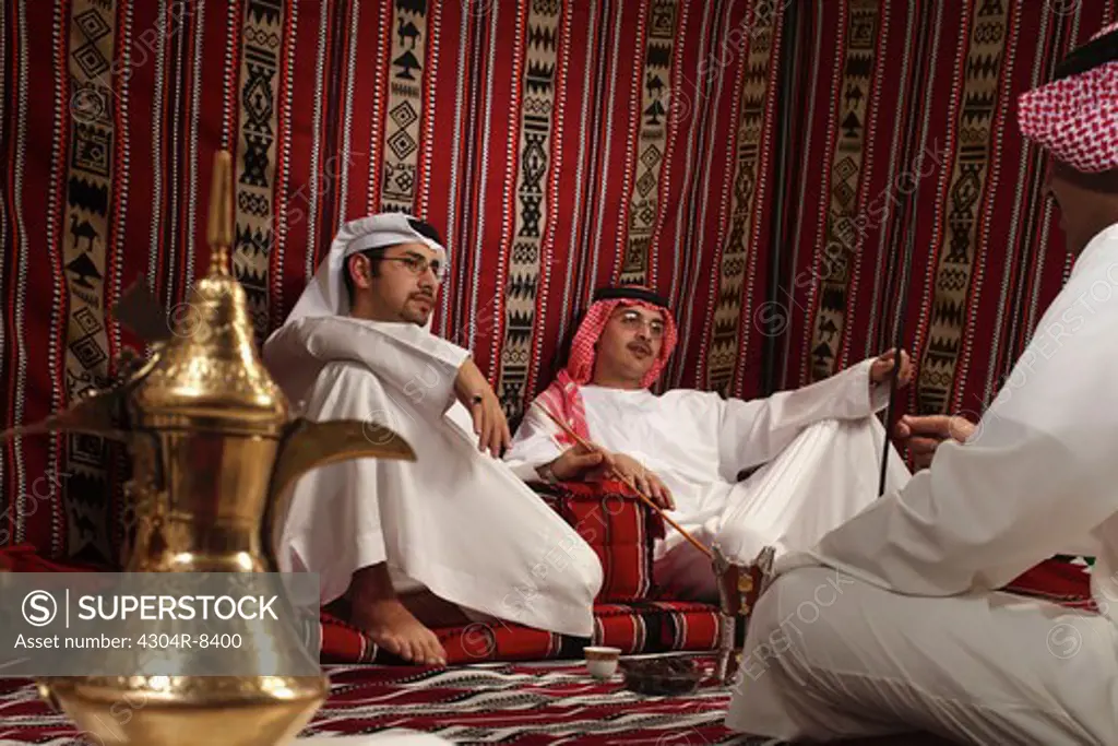 Arab men sitting in a majlis