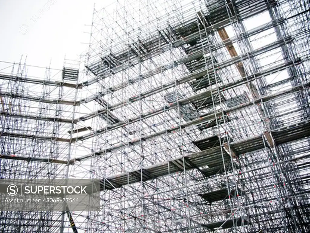 Building with scaffolding at construction site